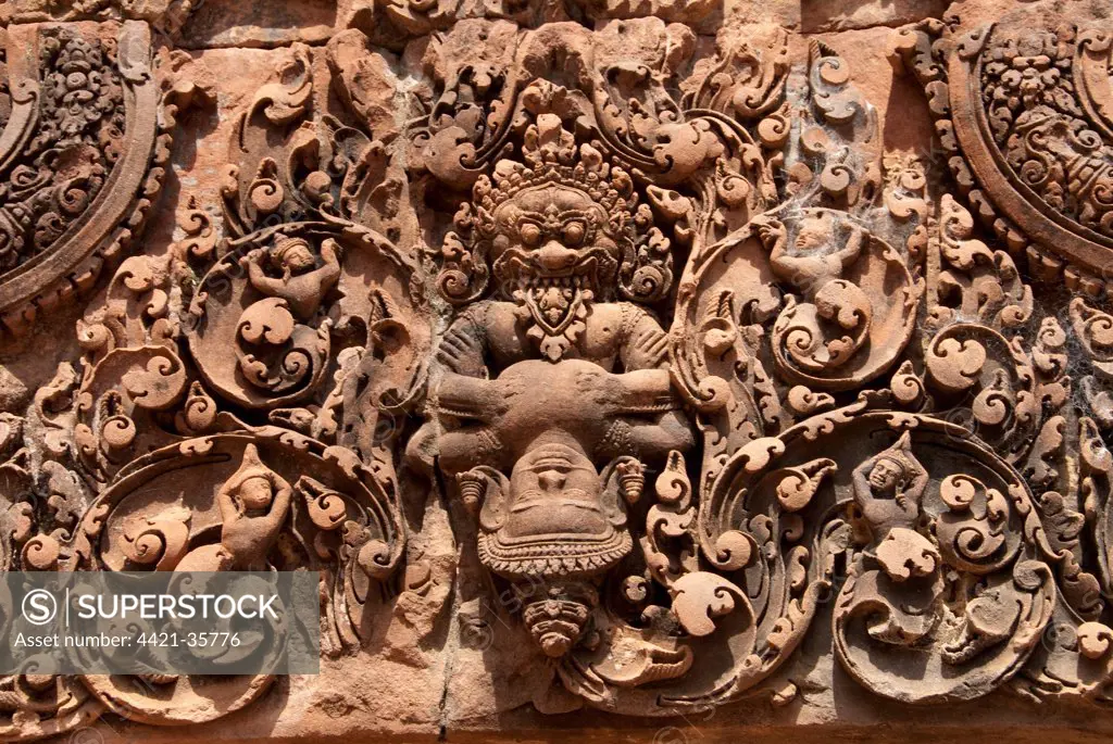 Bas-relief in Khmer Hindu temple depicting Vishnu ripping chest of King Hiranyakasipu, Banteay Srei, Angkor, Siem Riep, Cambodia