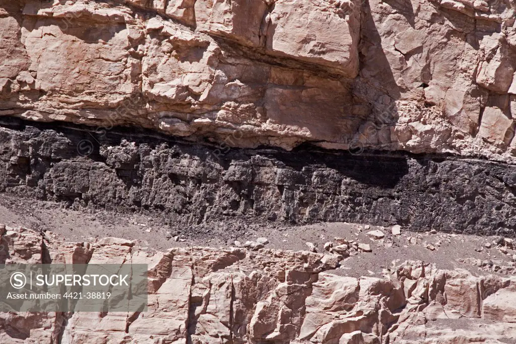 Exposed Bituminous coal seams in Utah # America. Bituminous coal is a dense sedimentary rock
