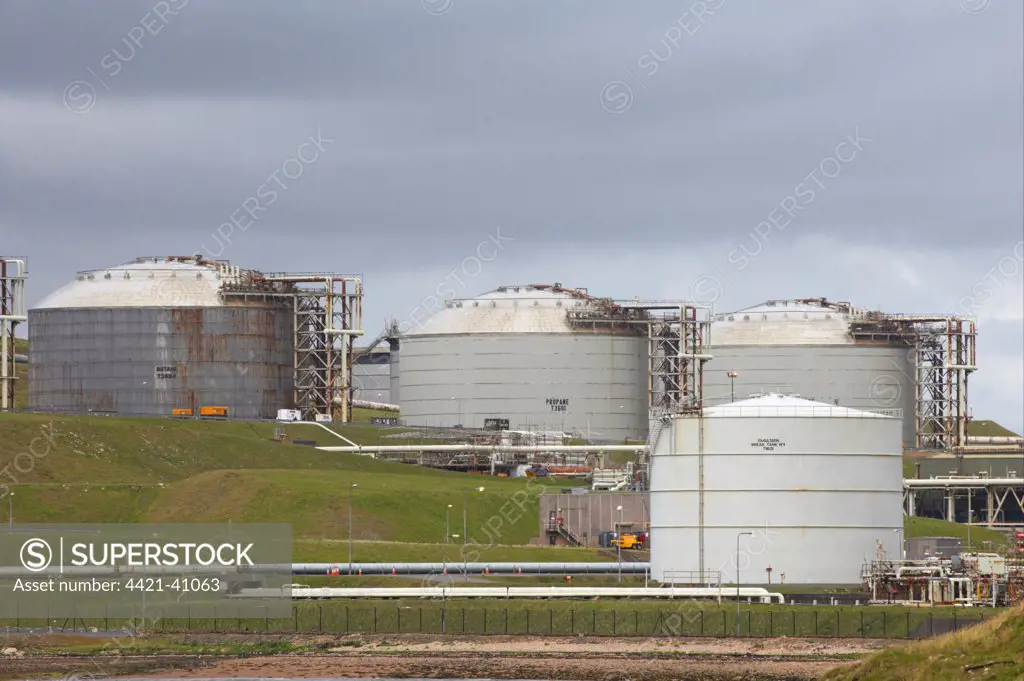 Storage tanks at coastal oil and liquefied gas terminal, Sullom Voe Oil Terminal, Sullom Voe, Mainland, Shetland Islands, Scotland