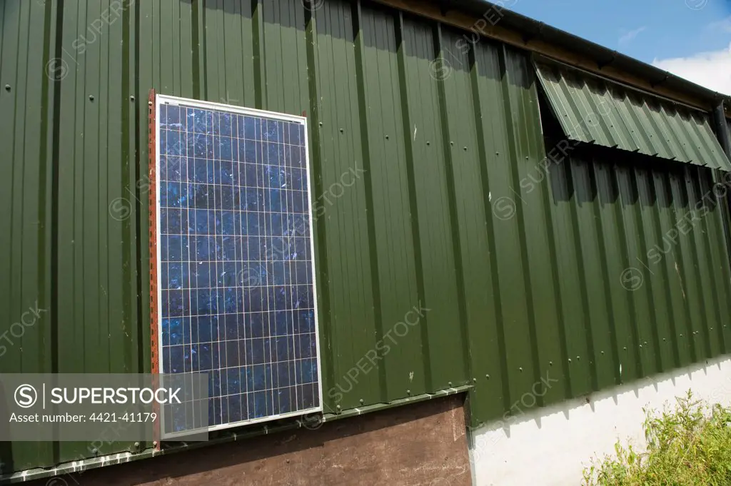 Solar energy panels, powering free-range hen unit building, Cumbria, England, june