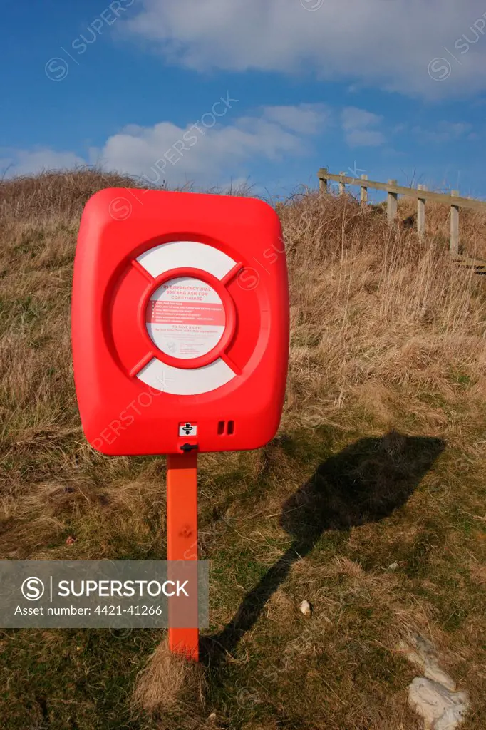 Lifebuoy in container on beach, Ringstead Bay, Dorset, England