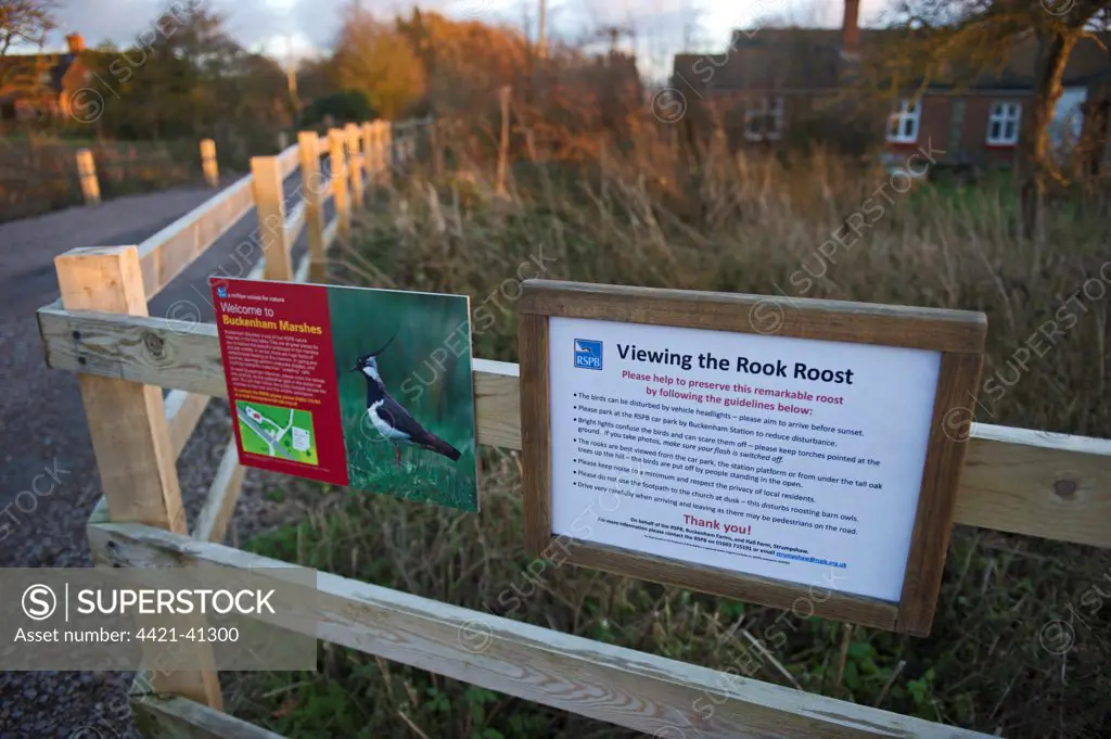'Viewing the Rook Roost' guidelines sign, Buckenham Marshes RSPB Reserve, Yare Valley, Norfolk, England, december