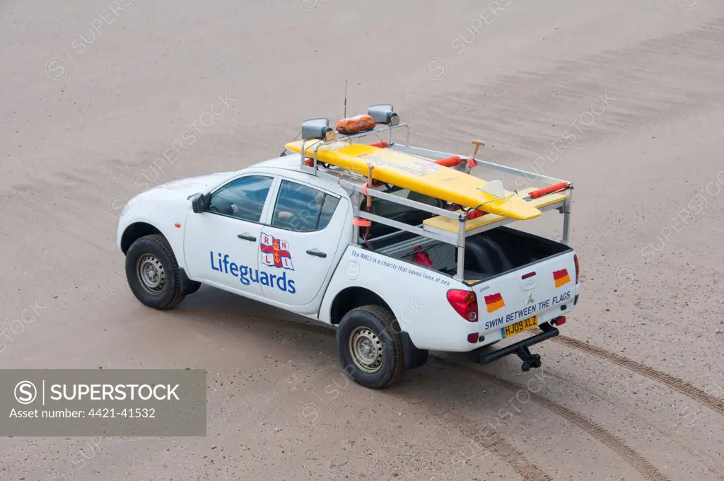 RNLI Lifeguard vehicle and equipment on beach, Filey, North Yorkshire, England, july