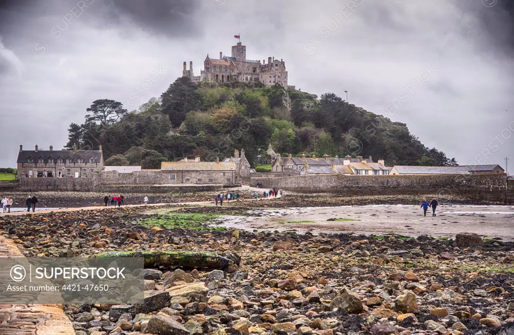 View of manmade causeway and tidal island at low tide, St. Michael's Mount, Mount's Bay, Marazion, Cornwall, England, May