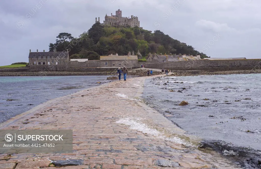 Seawater covering manmade causeway to tidal island, St. Michael's Mount, Mount's Bay, Marazion, Cornwall, England, May