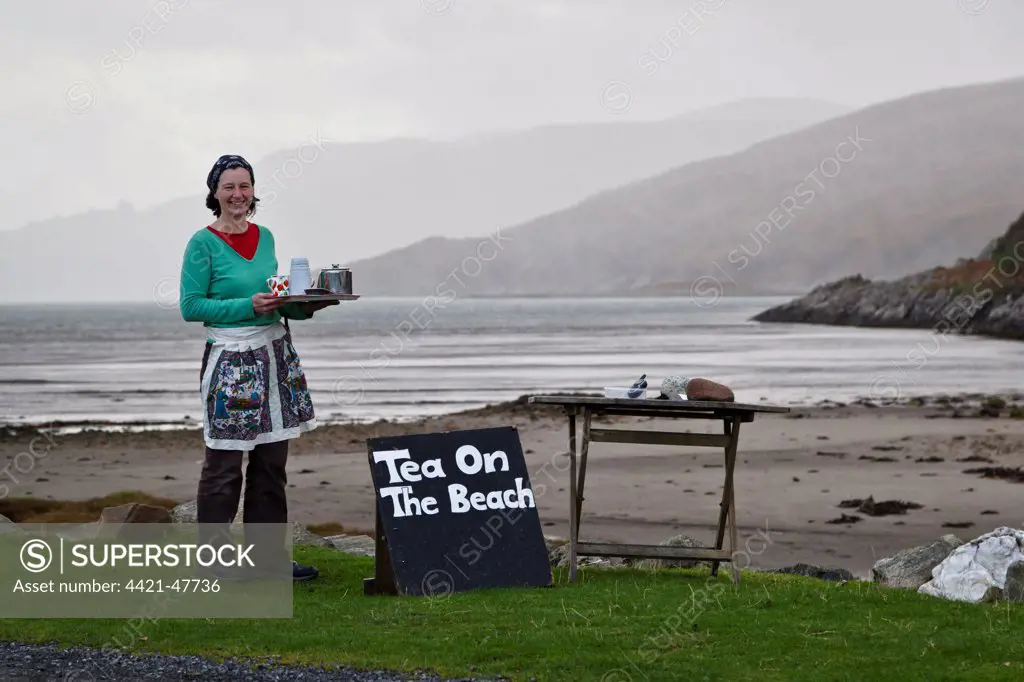 Georgina Kitching serving tea at 'Tea on the Beach', Inverlussa Bay, Isle of Jura, Inner Hebrides, Scotland