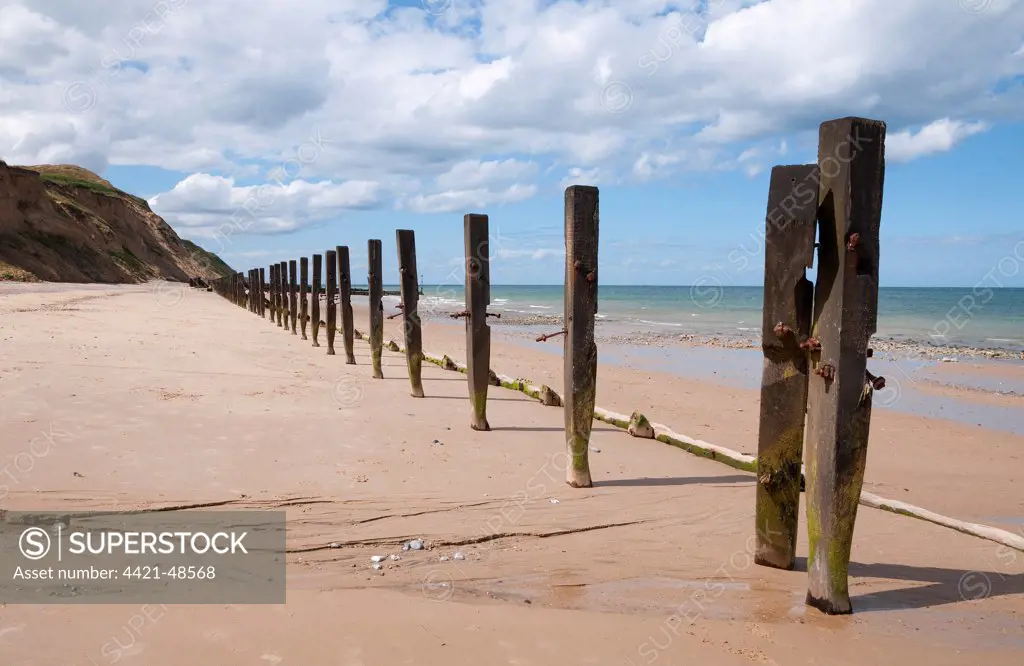 Failed sea defences on beach, West Runton, Norfolk, England, August