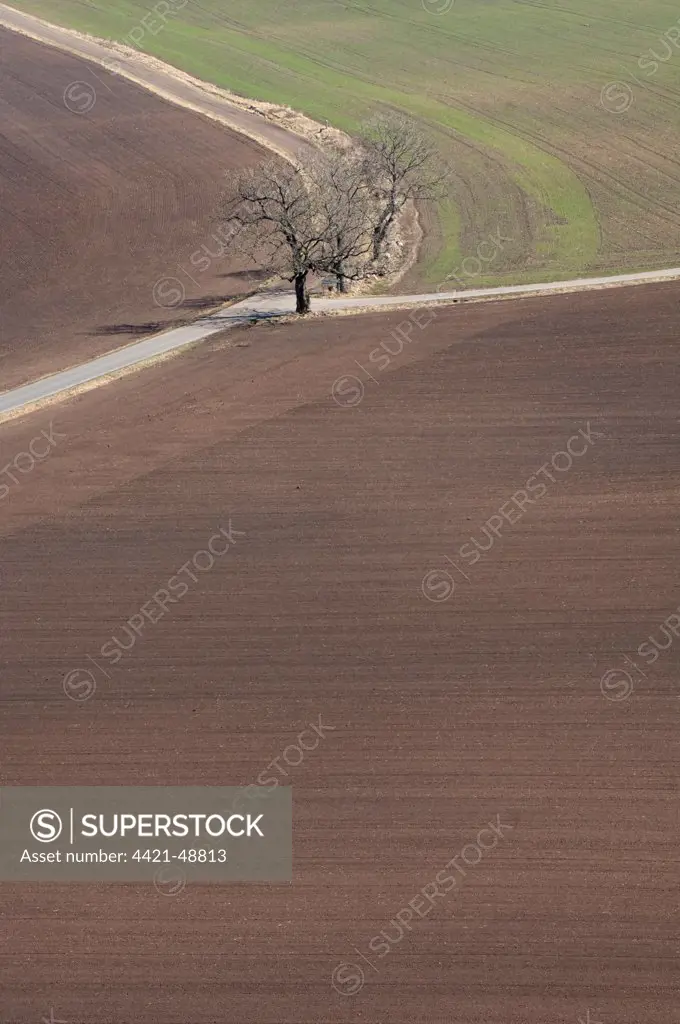 Arable farmland with cultivated fields and road, Vastergotland, Sweden, spring