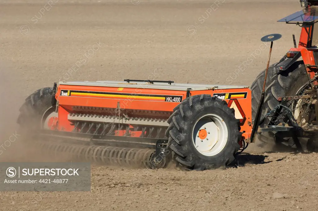 Close-up of Tume HKL-4000 seed drill, drilling field, Sweden, spring