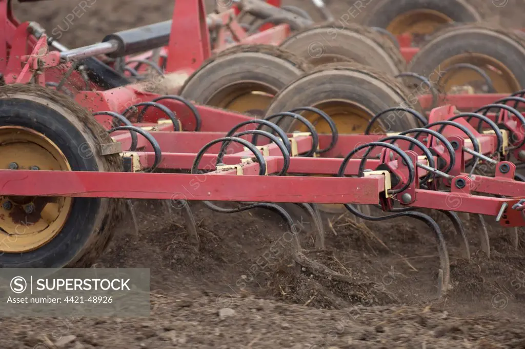Close-up of harrows, cultivating arable field, Sweden, may