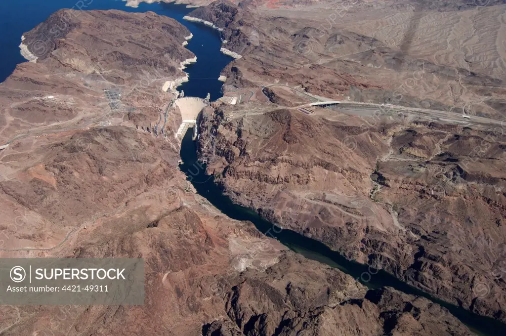Aerial view of arch-gravity dam on river, Hoover Dam, Black Canyon, Colorado River, Arizona / Nevada border, U.S.A.