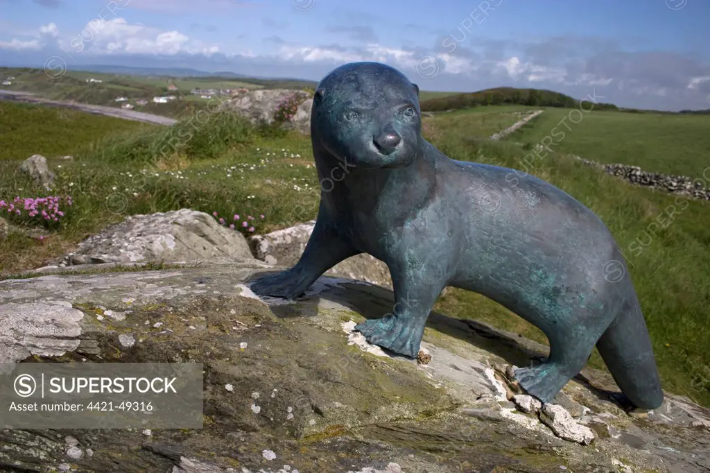 Bronze otter memorial, erected in memory of Gavin Maxwell (author and naturalist), near Monreith, Machars, Wigtownshire, Galloway, Dumfries and Galloway, Scotland, May