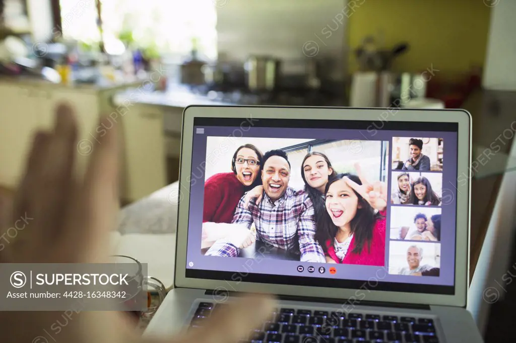 POV Friends video chatting on laptop screen