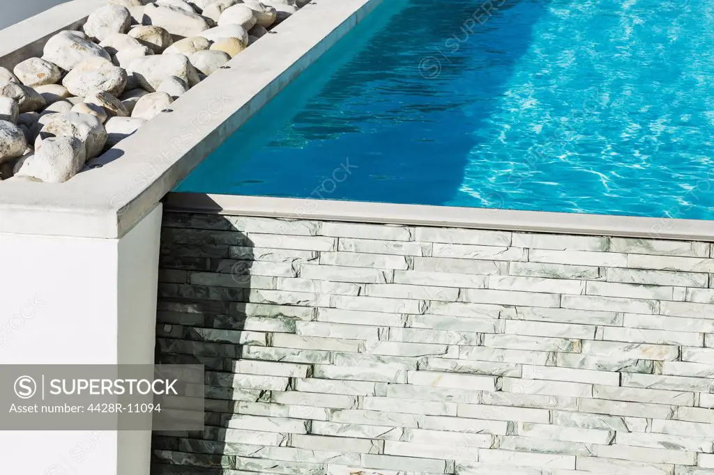 Rocks and wall around lap pool