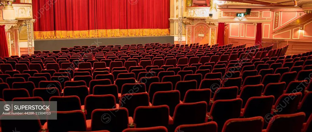 Empty chairs in theater