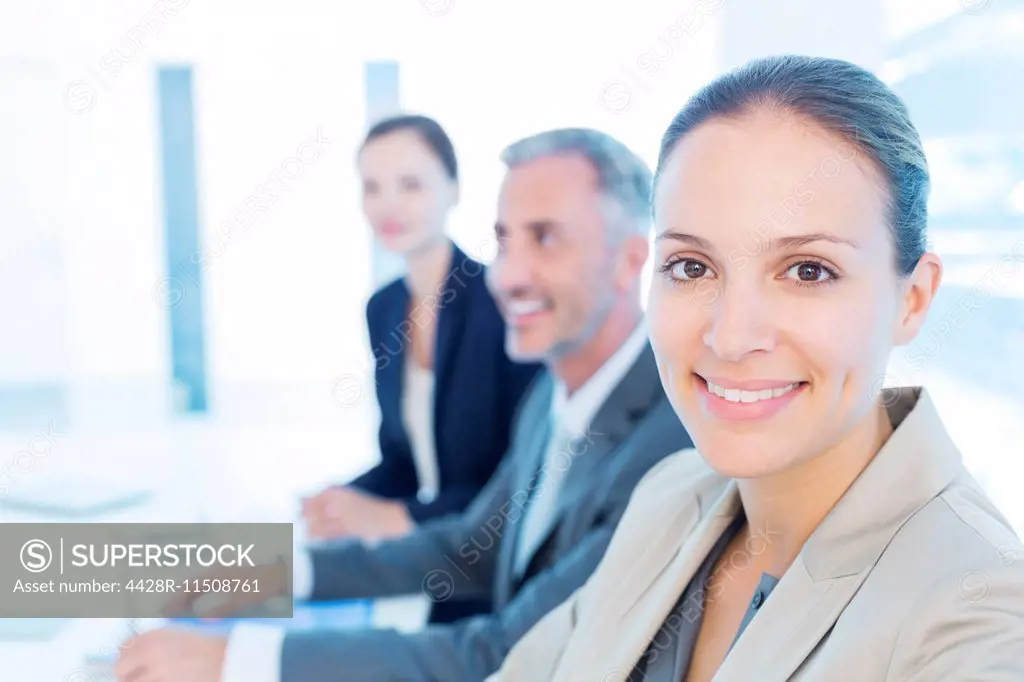 Portrait of confident businesswoman in meeting