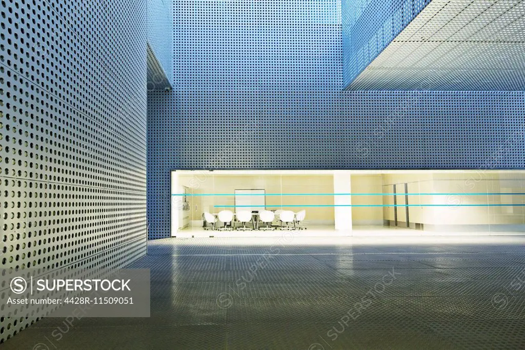 Illuminated conference room in modern building
