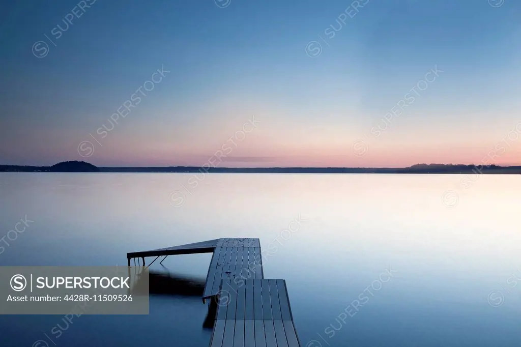 Dock over still lake, Saratoga Lake, New York, United States