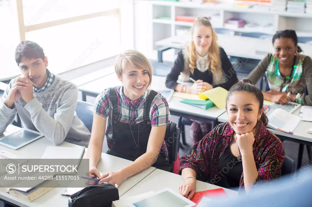 Teenage students learning in classroom