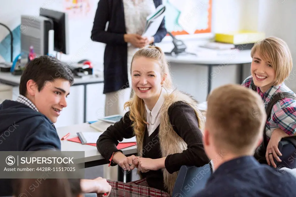 High School students sitting and smiling in classroom