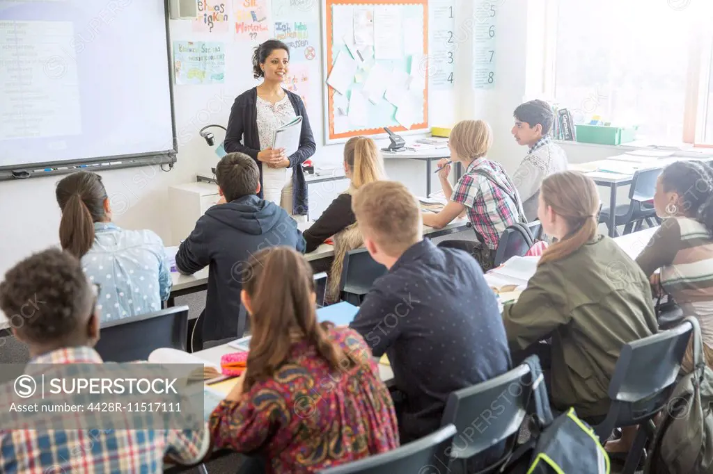 Teacher and students in classroom during lesson