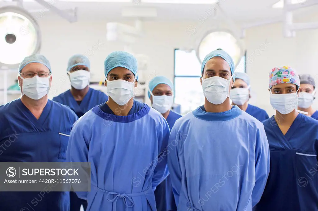 Team of surgeons in operating theater