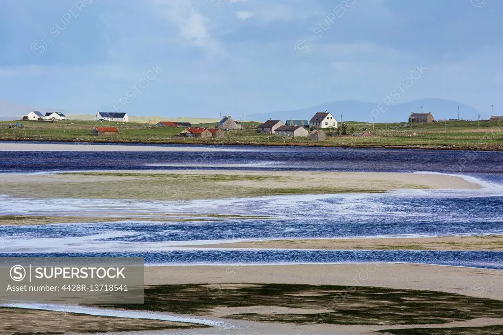 Sunny view fishing village and water, Oronsay, North Uist, Outer Hebrides