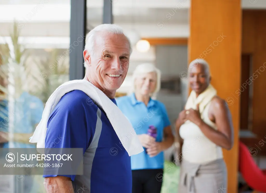 Los Angeles, USA, Smiling older man wearing towel