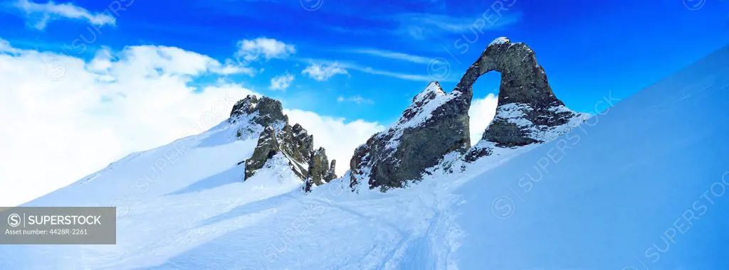 Snow covered craggy mountain