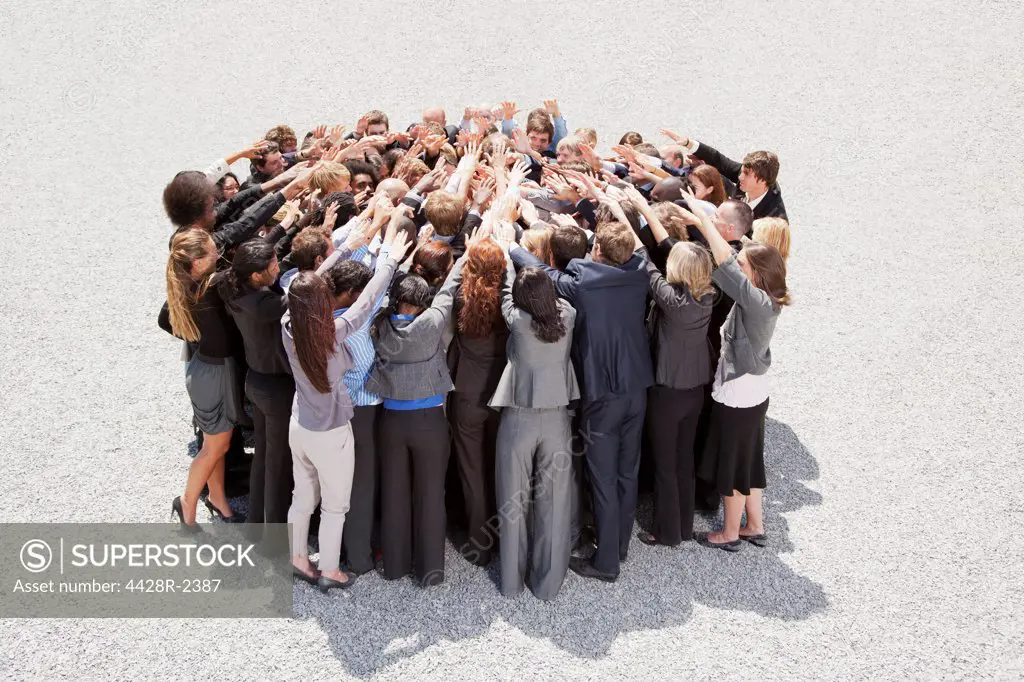Cape Town, South Africa, Crowd of business people in huddle