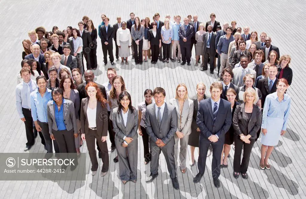 Cape Town, South Africa, Portrait of smiling business people forming circle