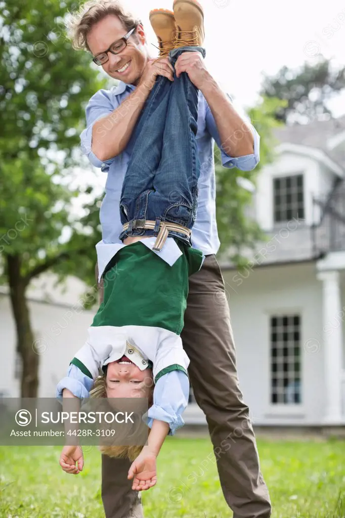 Father and son playing together outdoors,Hamburg, Germany