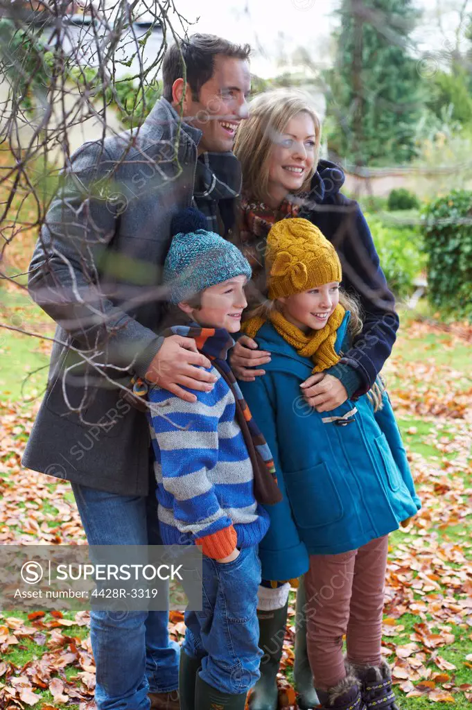 Family smiling together outdoors,belmonthouse, UK