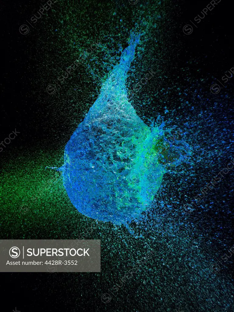 High speed image of water balloon popping,Studio