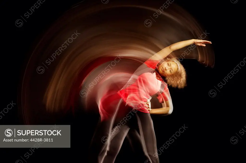 Time lapse view of dancer stretching,Studio