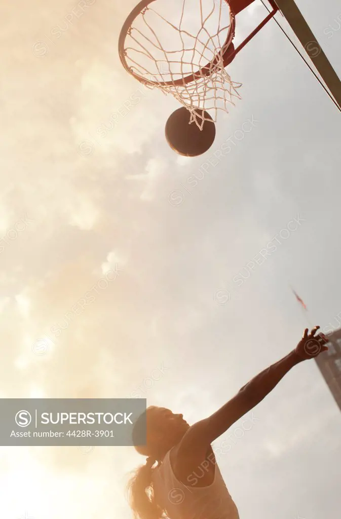 Man playing basketball on court,New York