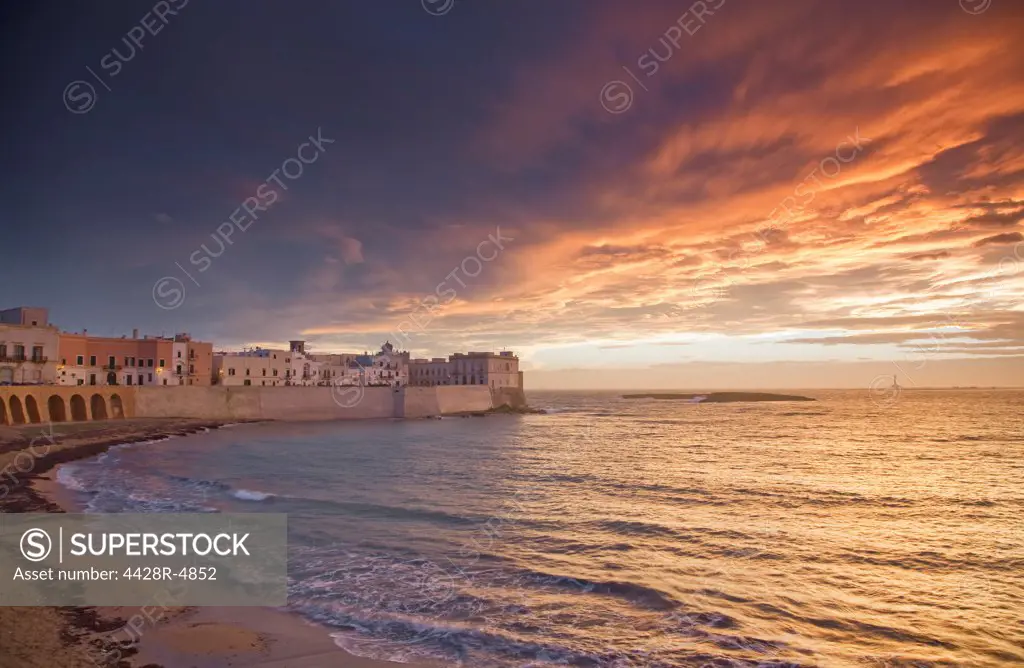 Waves washing up on coastal city walls,Old city, Gallipoli, Puglia Italy
