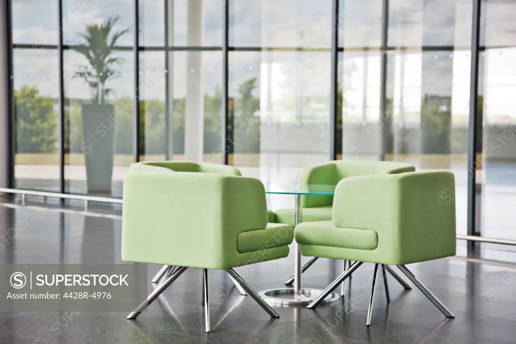 Chairs and table in office lobby area,Farnborough, United Kingdom