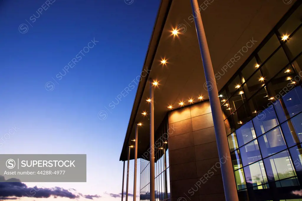 Modern building illuminated at sunset,Farnborough, United Kingdom