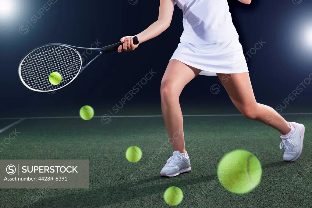 Multiple exposure of tennis player hitting ball on court