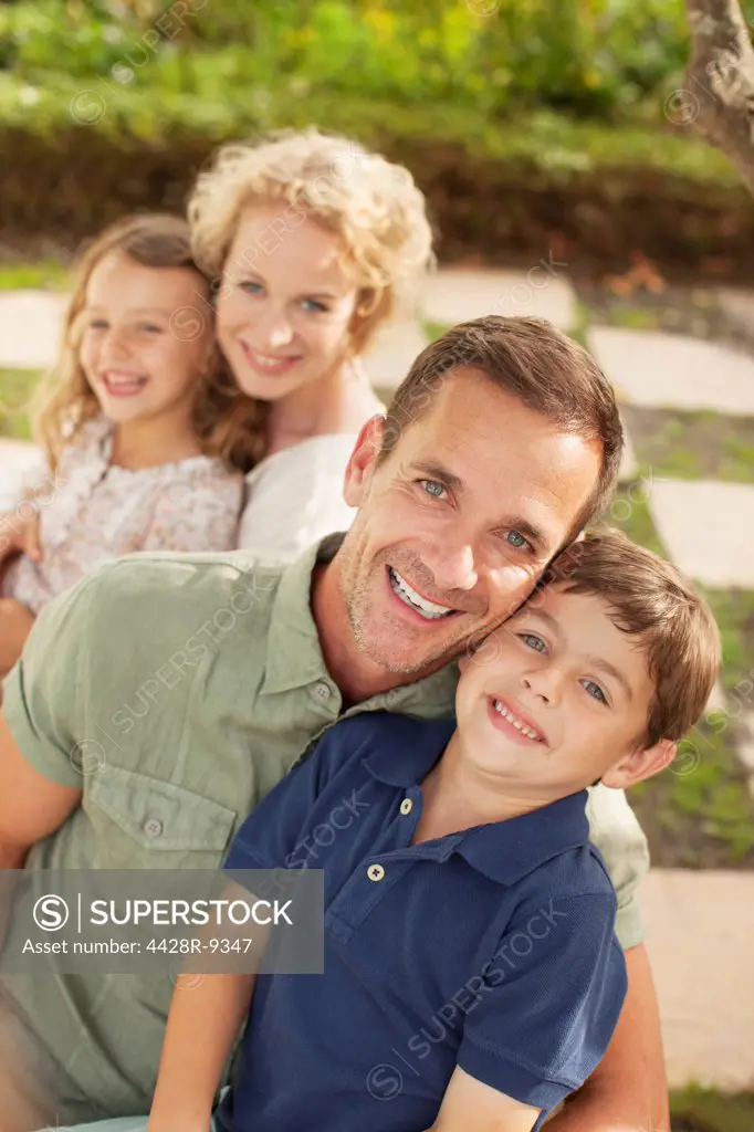 Portrait of smiling family outdoors