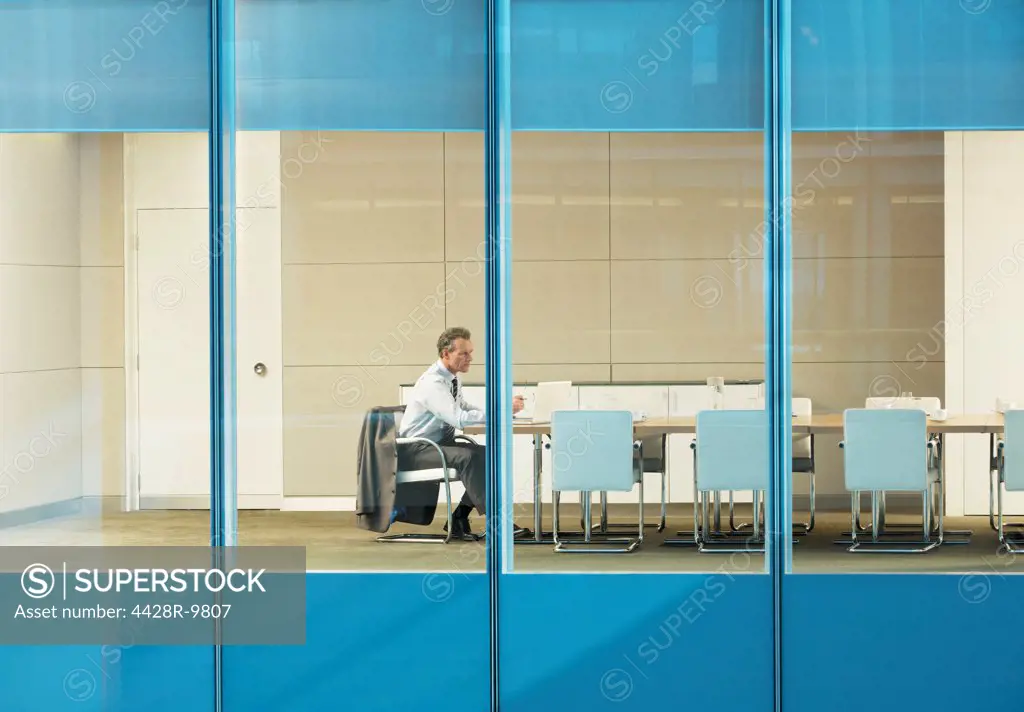 Businessman sitting in conference room