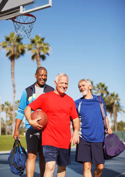 Los Angeles, USA, Older men playing basketball on court