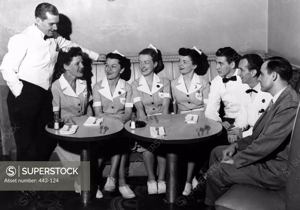 Group of people in a restaurant, 1940