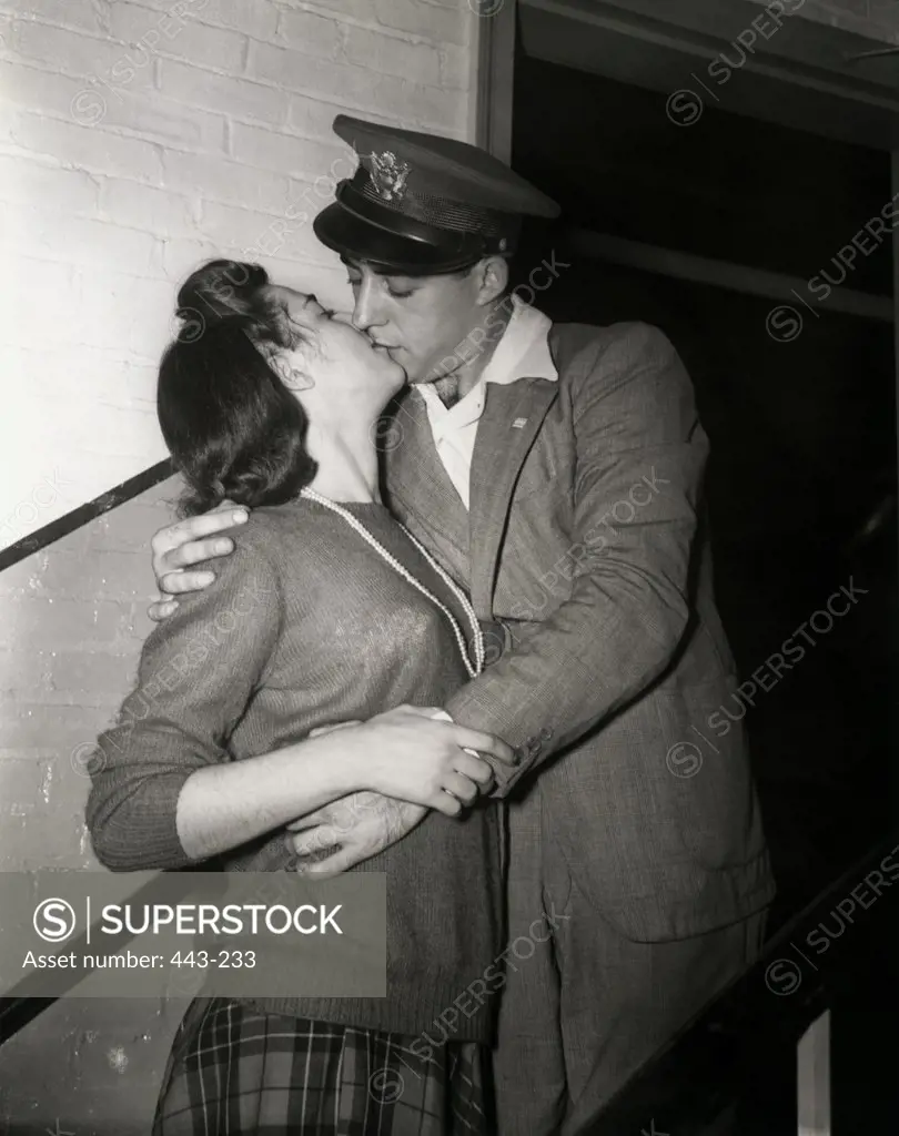 Young couple kissing, 1940