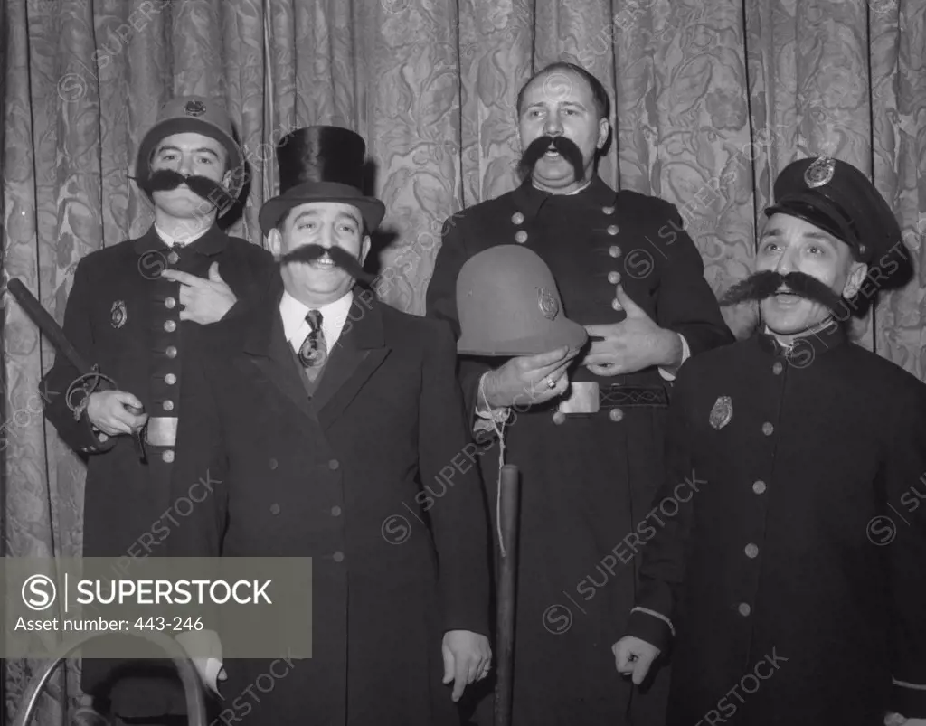Four mature men singing a song, Barbershop Quartet, 1945