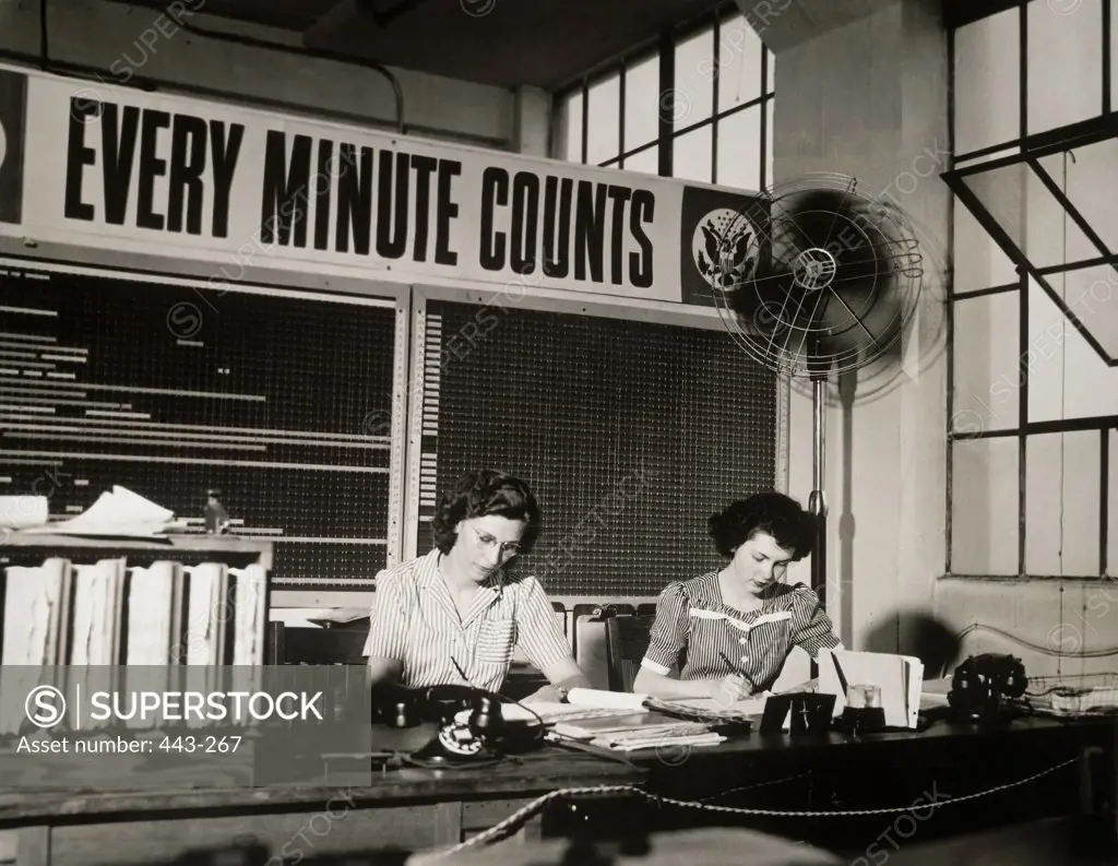Two businesswomen working in an office, 1942