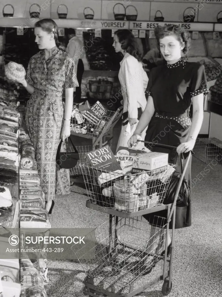Three young women in a grocery store