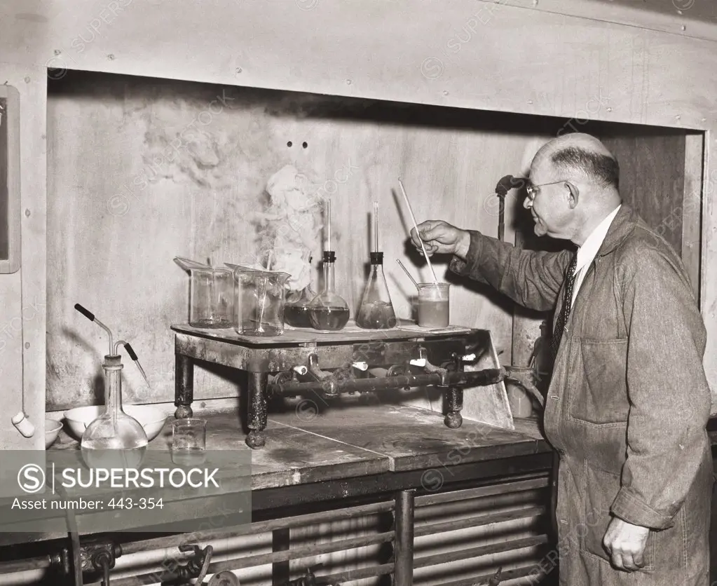 Side profile of a male scientist experimenting in a laboratory