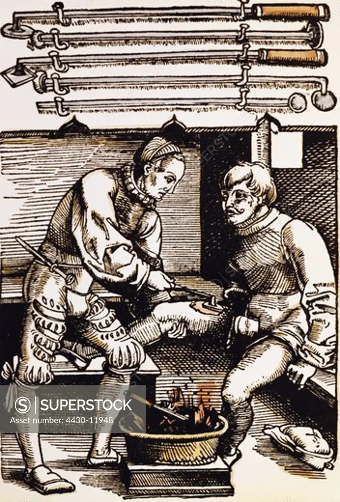 medicine treatment cauterization woodcut coloured from ""Feldtbuch der Wundartzney"" by Hans von Gersdorff Strasbourg Germany 1528,